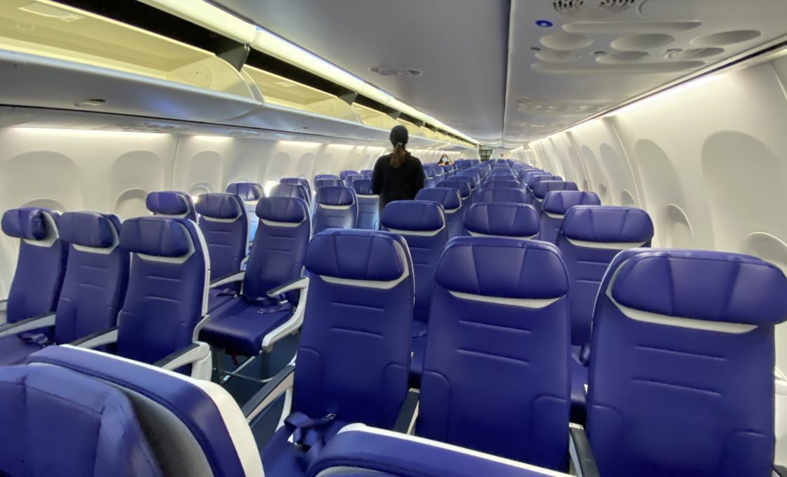 Rows of seats inside Southwest plane.